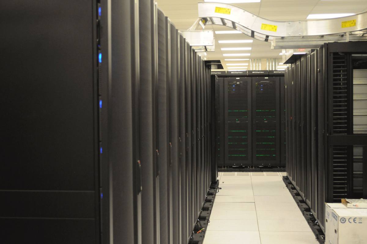 Rows of server racks in a data center